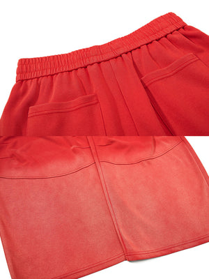 Embroidered sweatpants – Red waistband and faded hem close-up | XoKool