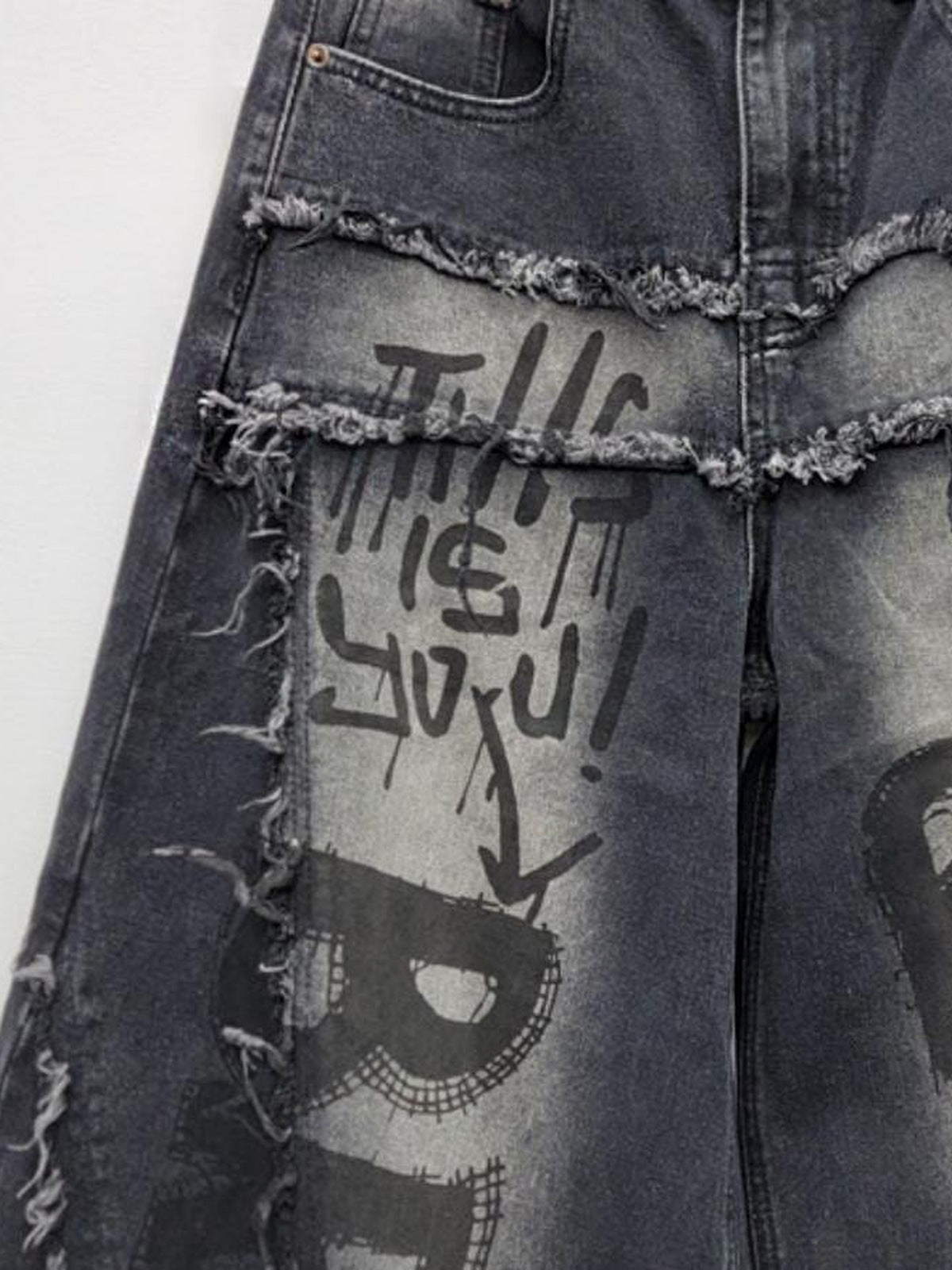 Graffiti Barrel Jeans with Frayed Panel Seams – front side close-up | XoKool