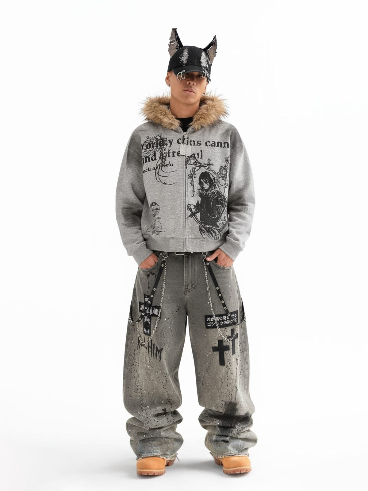 Graue Baggy Jeans mit Farbspritzern und Kreuz-Print – am Model, von vorne | XoKool
