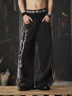 Pantalones deportivos de pierna ancha grises con doble cintura y tachuelas – Negro, en modelo, frente | XoKool