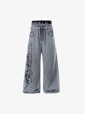 Pantalones deportivos de pierna ancha grises con doble cintura y tachuelas – Gris, vista frontal | XoKool