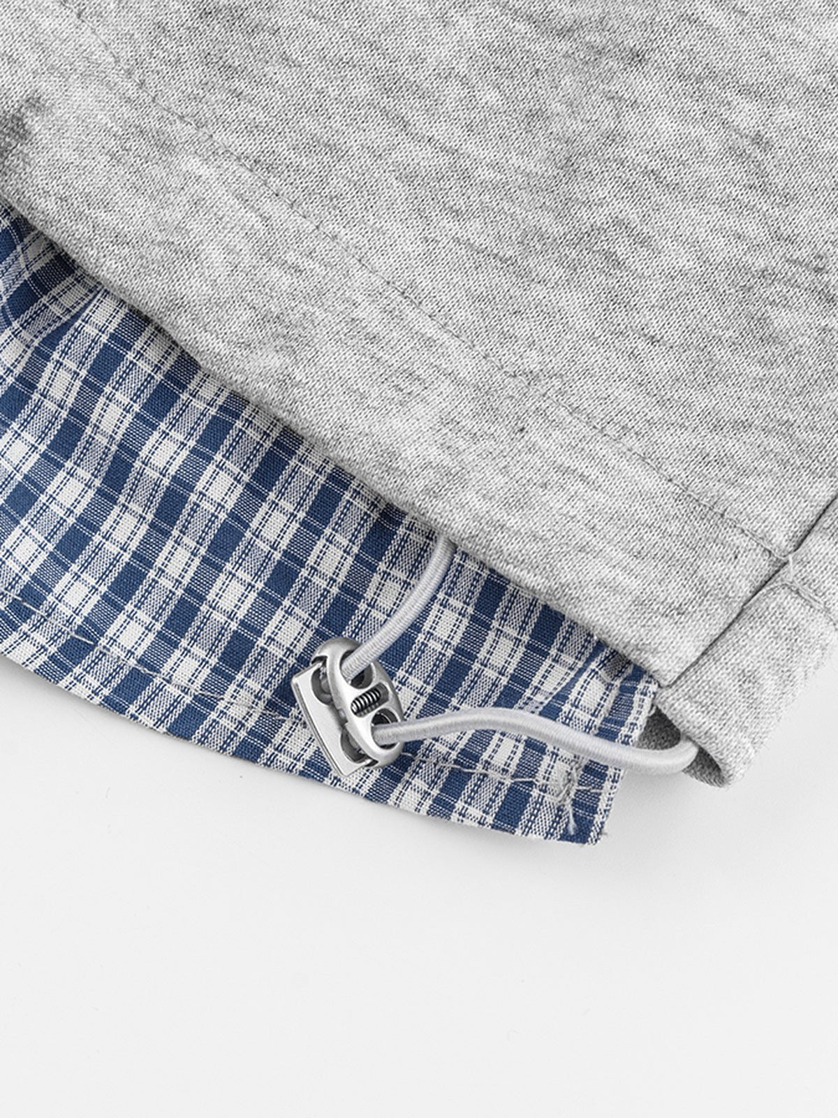 Sleeveless layered shirt – drawcord hem close-up | XoKool