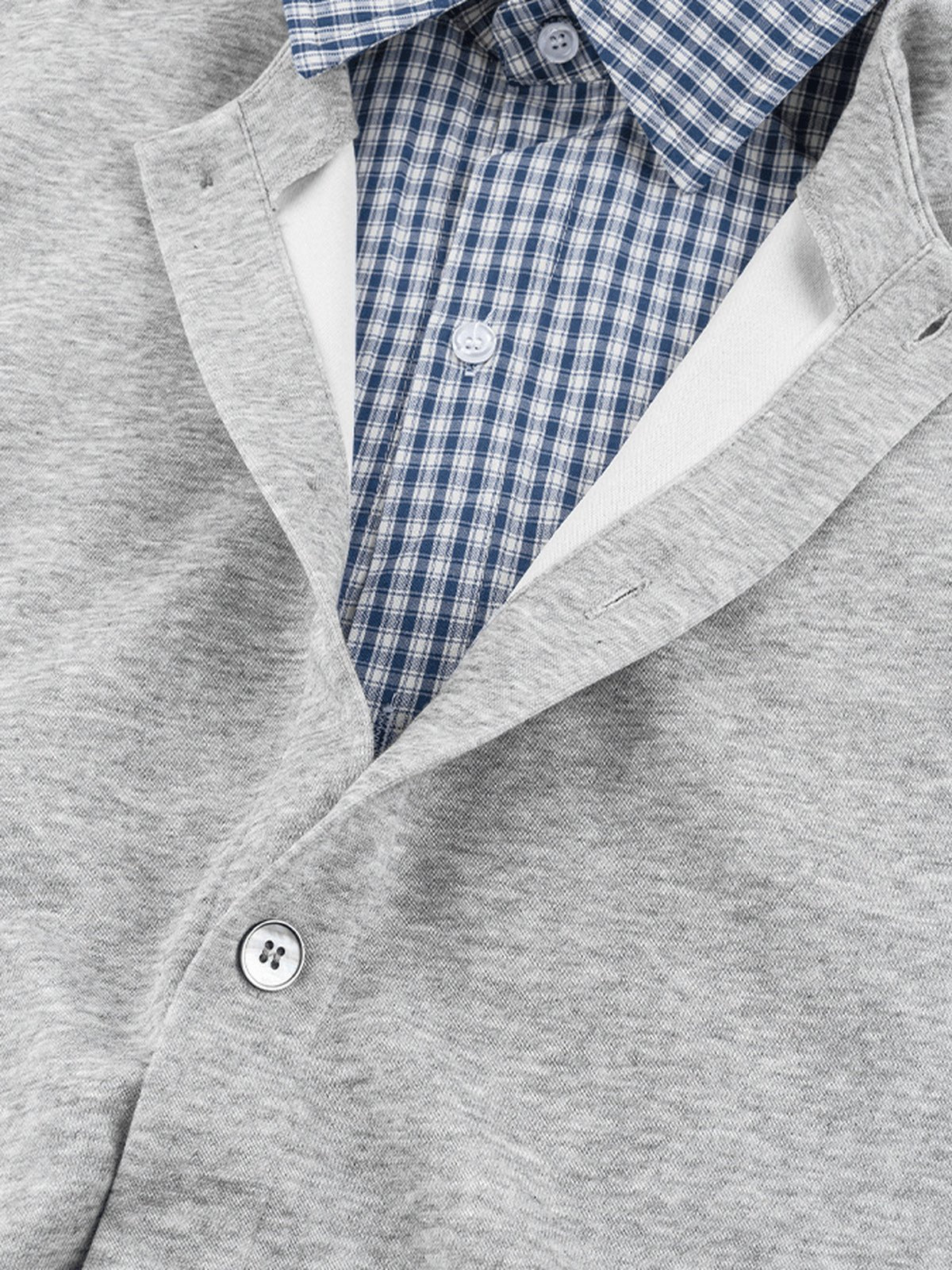 Sleeveless layered shirt – front placket close-up | XoKool