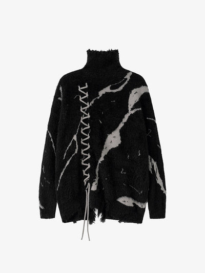 Maglione nero a collo alto peloso con lacci