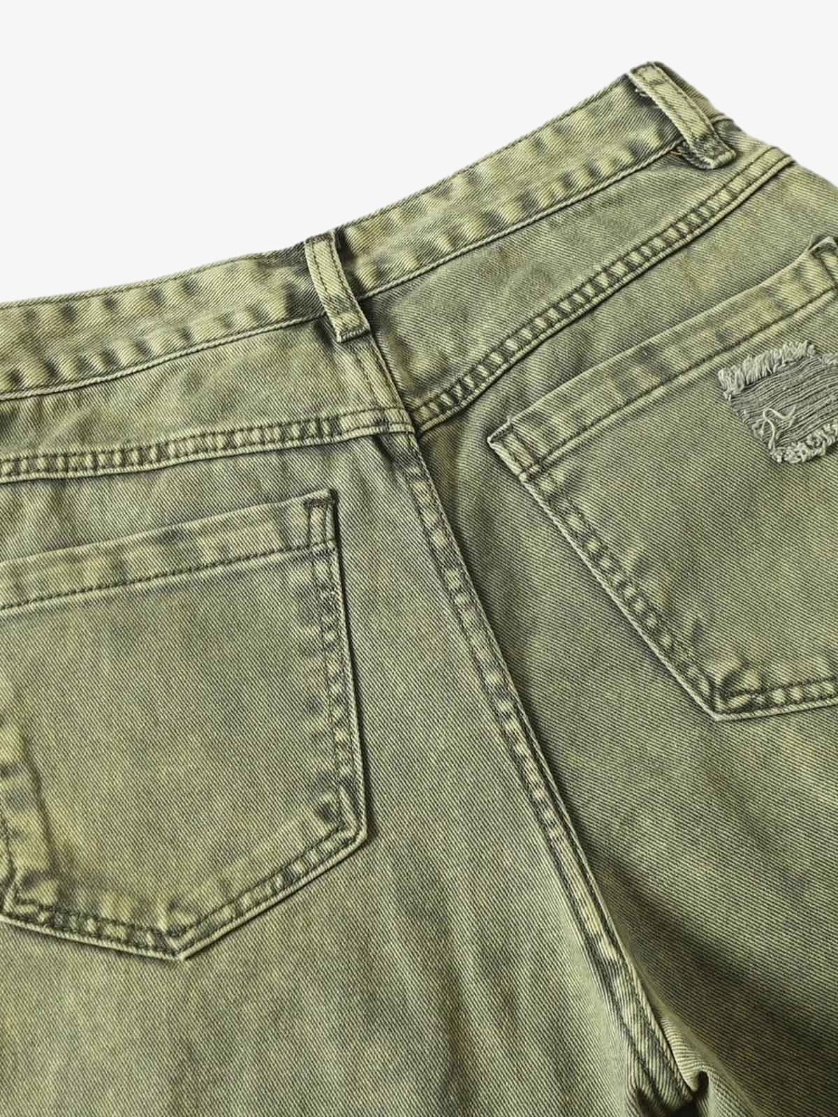 Ripped barrel jeans – back pocket close-up | XoKool