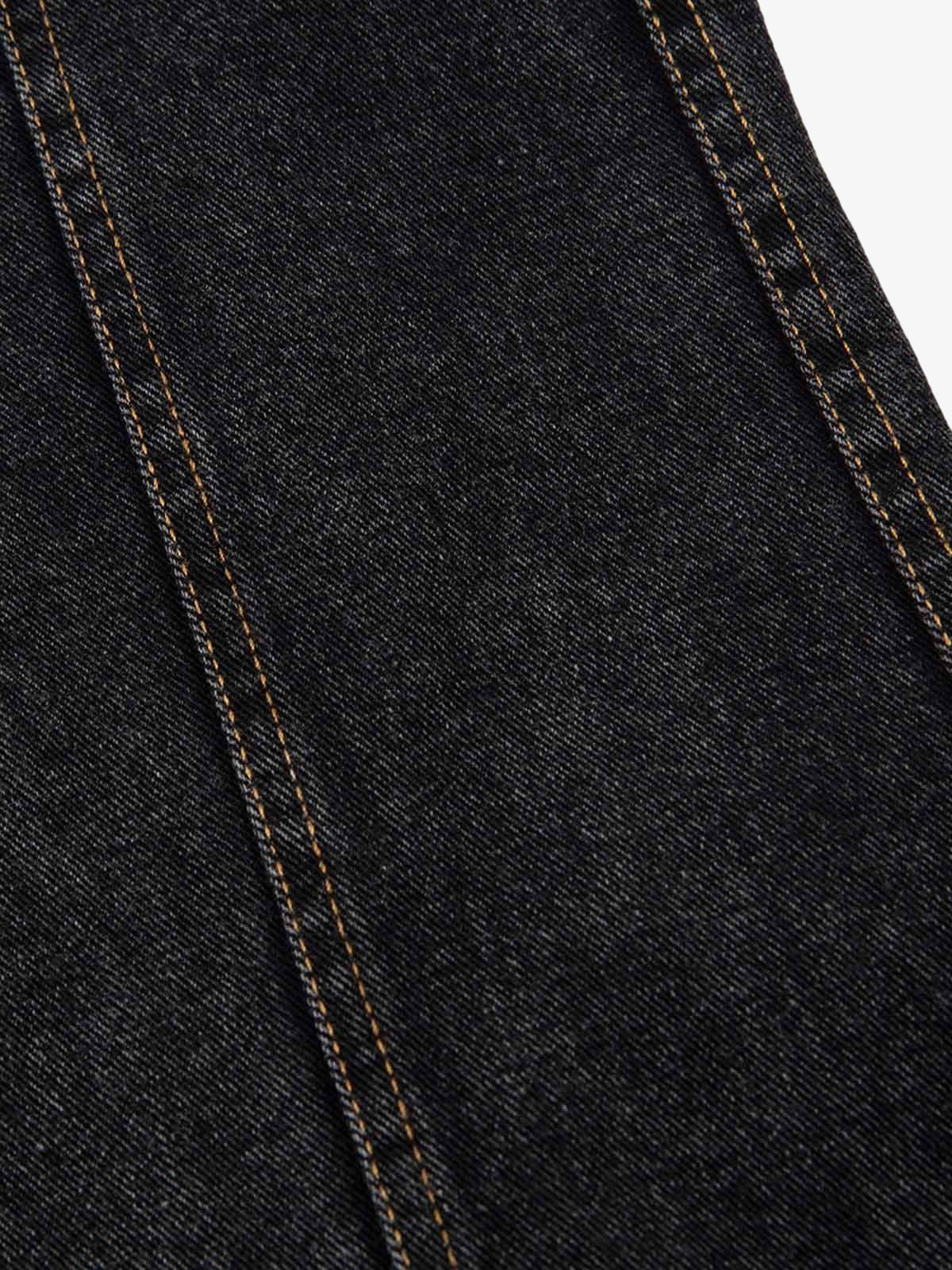 Washed black baggy jeans – seam close-up | XoKool