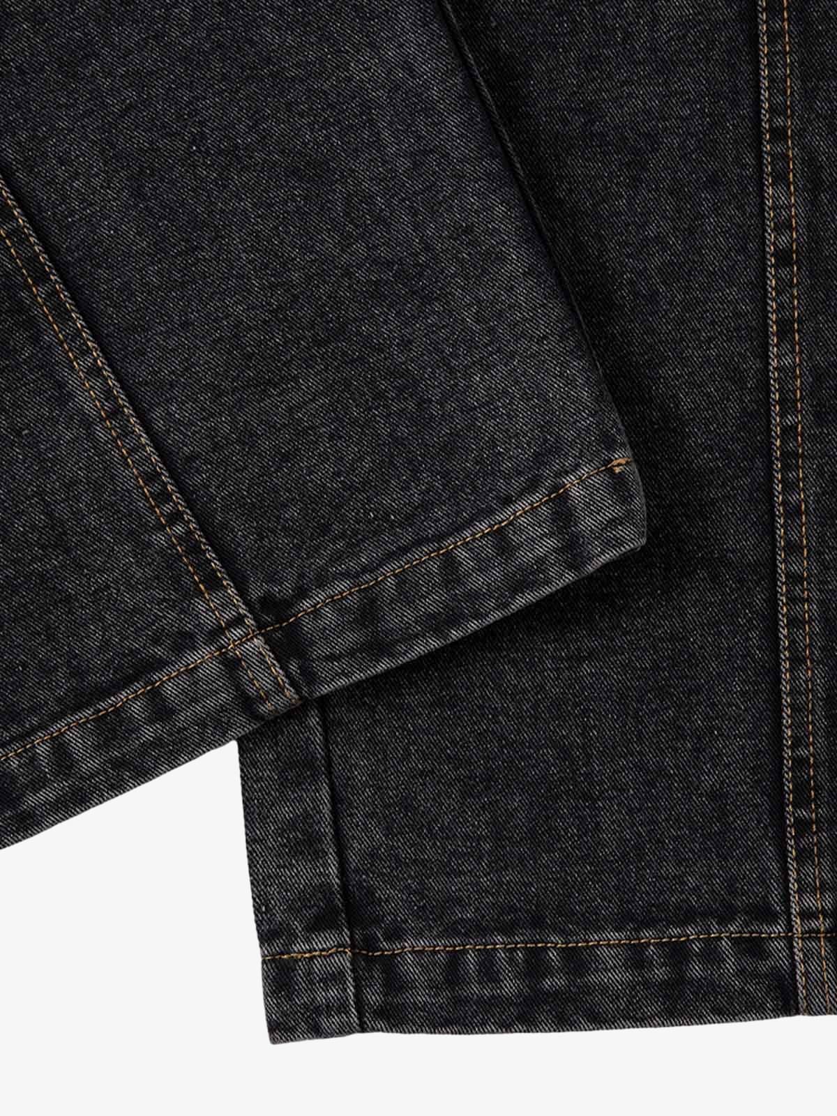 Washed black baggy jeans – hem close-up | XoKool