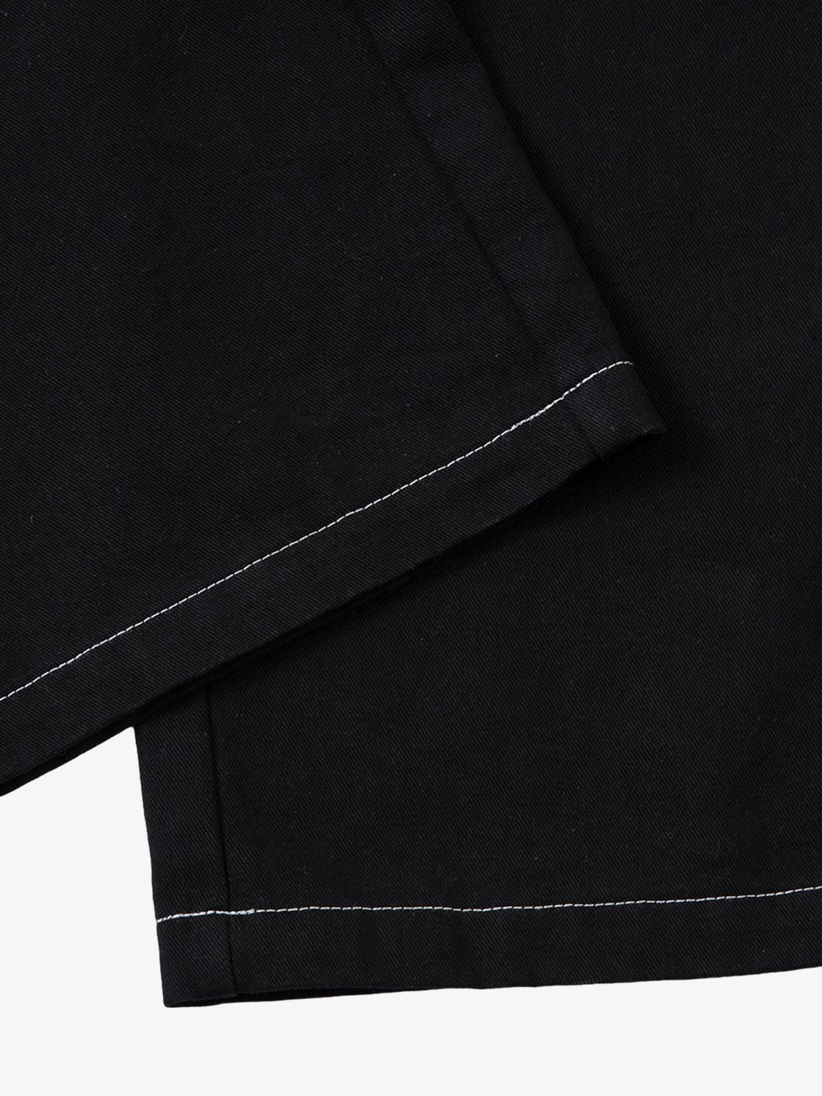 Flame embroidered jeans – hem close-up | XoKool