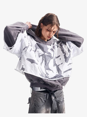 Layered Grunge Hoodie with Face Print Overlay – on model, arms raised | XoKool