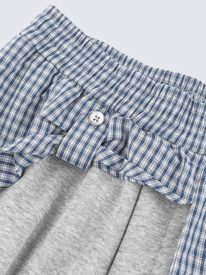 Layered sweatpants – shirt button close-up | XoKool