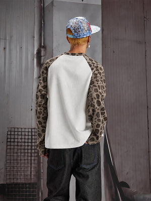 Leopard Sleeve Raglan Long Sleeve Tee with Star Cross – on model, back | XoKool