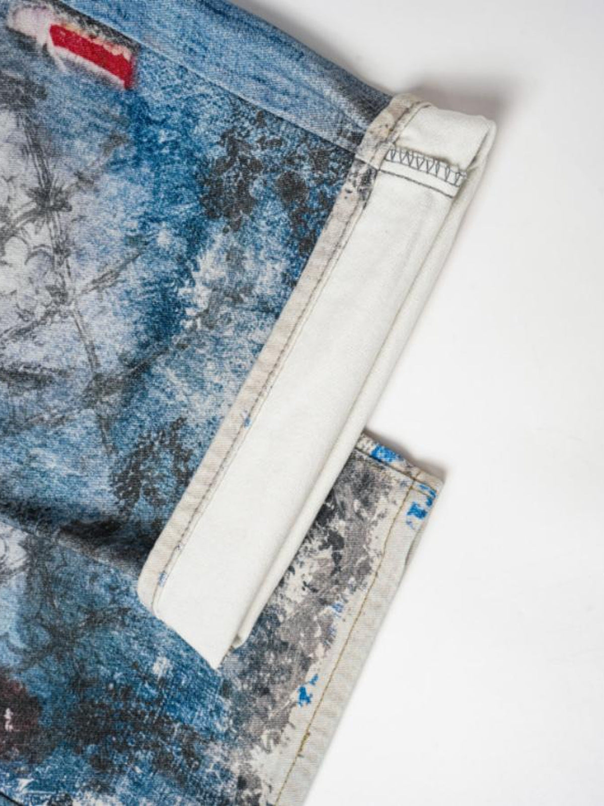 Light Blue Printed Baggy Jeans with Chain – hem cuff / inside detail | XoKool