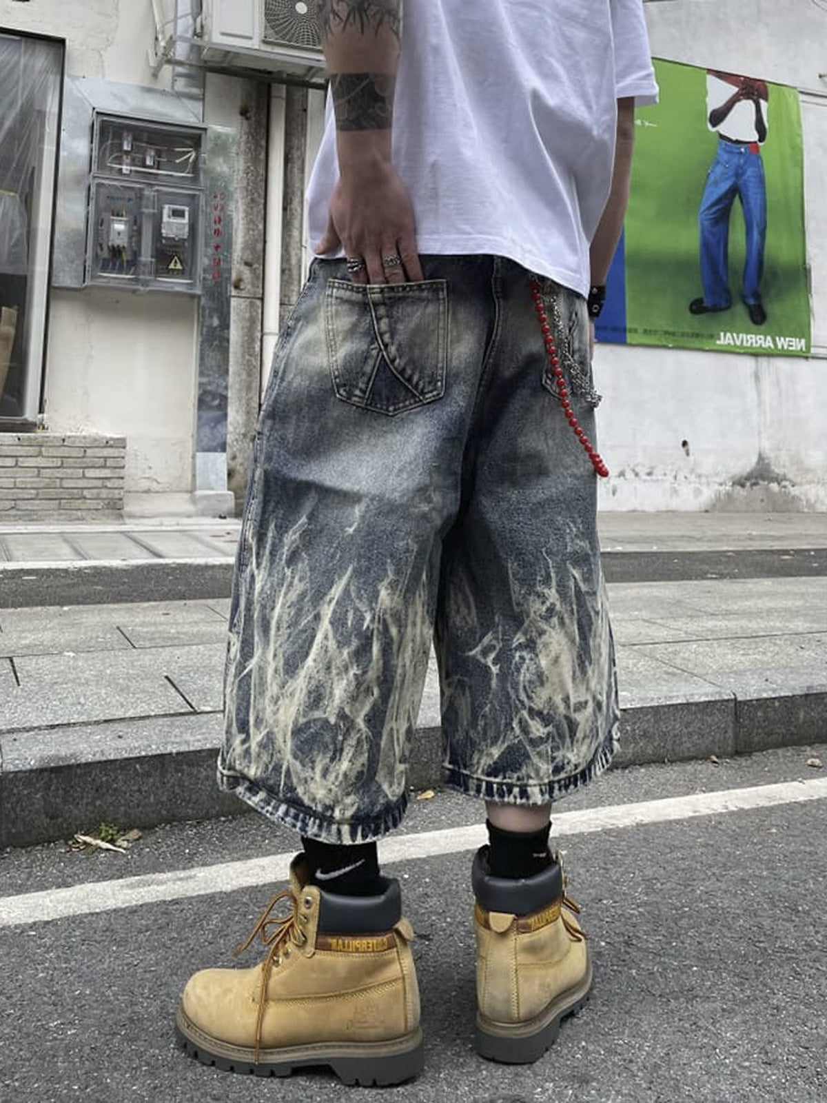 Flame wash jorts – on model, close, street | XoKool