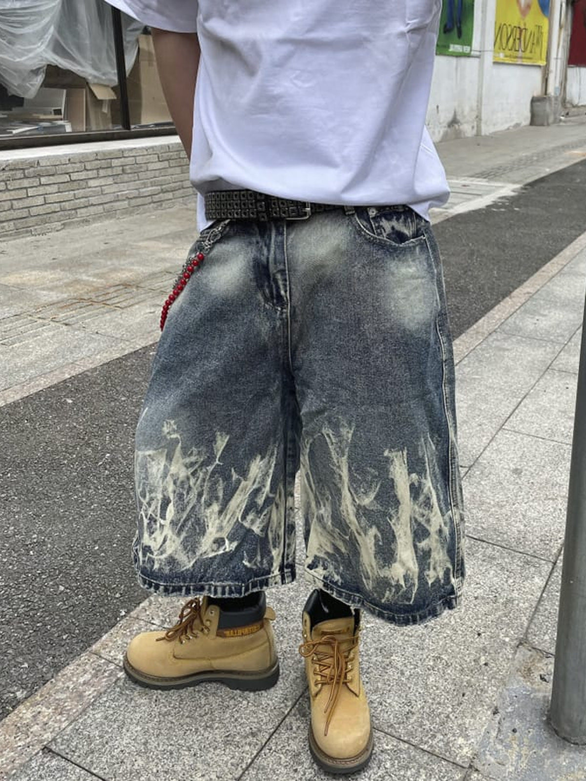 Long Baggy Jorts with Bleached Flame Wash – on model, front, street | XoKool