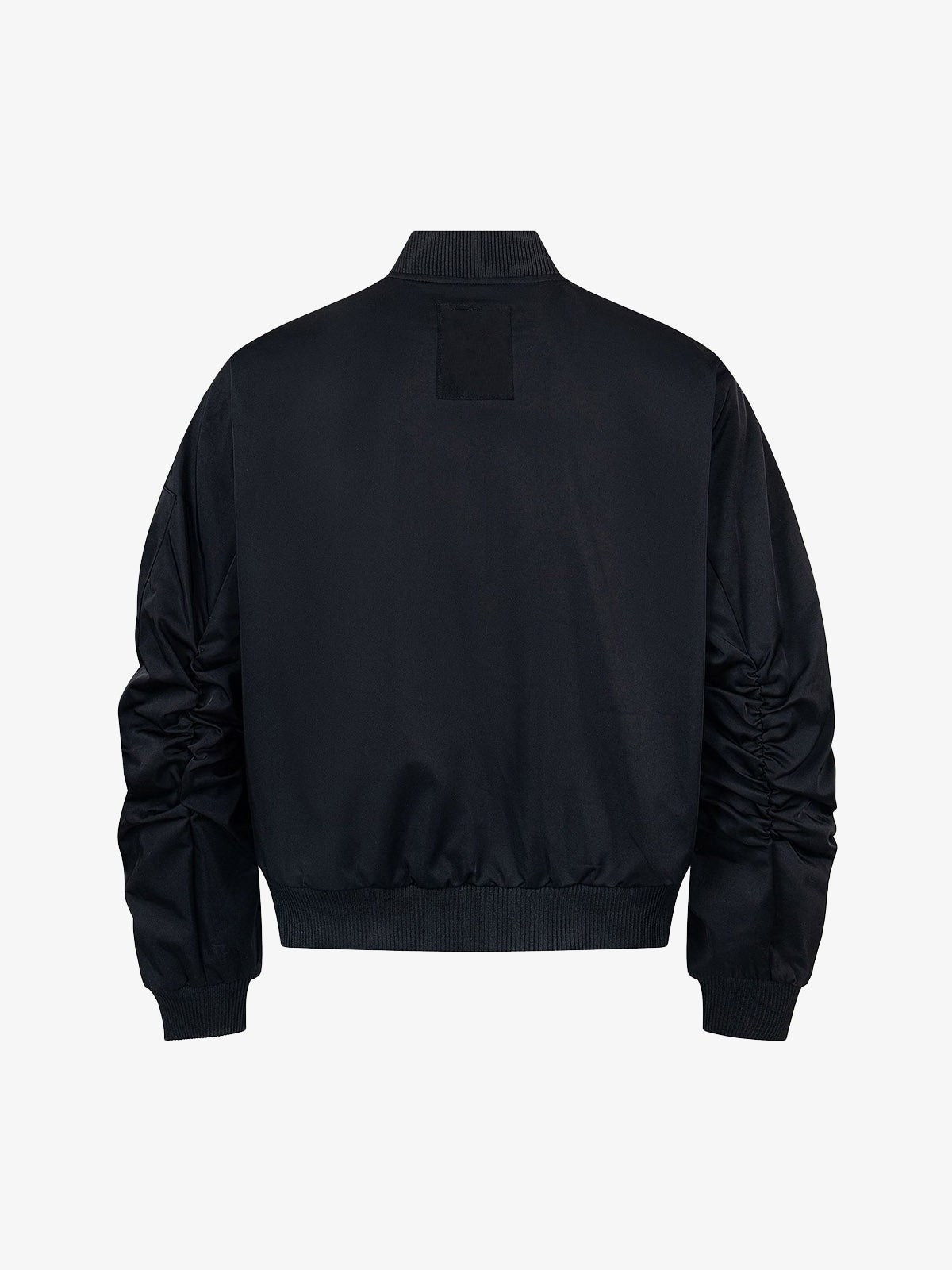 Chaqueta bomber estilo MA-1 con paneles curvos – Negro, vista trasera en plano | XoKool