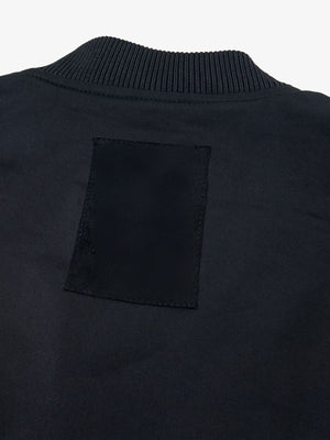 Chaqueta bomber MA-1 – detalle del parche trasero | XoKool