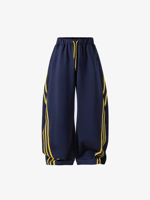Pantalones deportivos de pierna ancha azul marino con rayas amarillas – azul marino, parte delantera plana | XoKool