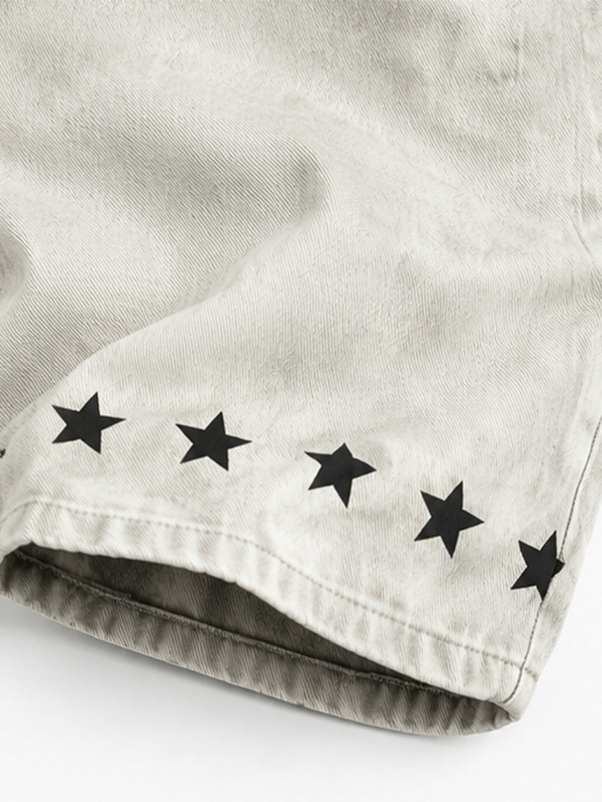 Offwhite Slogan Jeans – Stern-Saum Nahaufnahme | XoKool