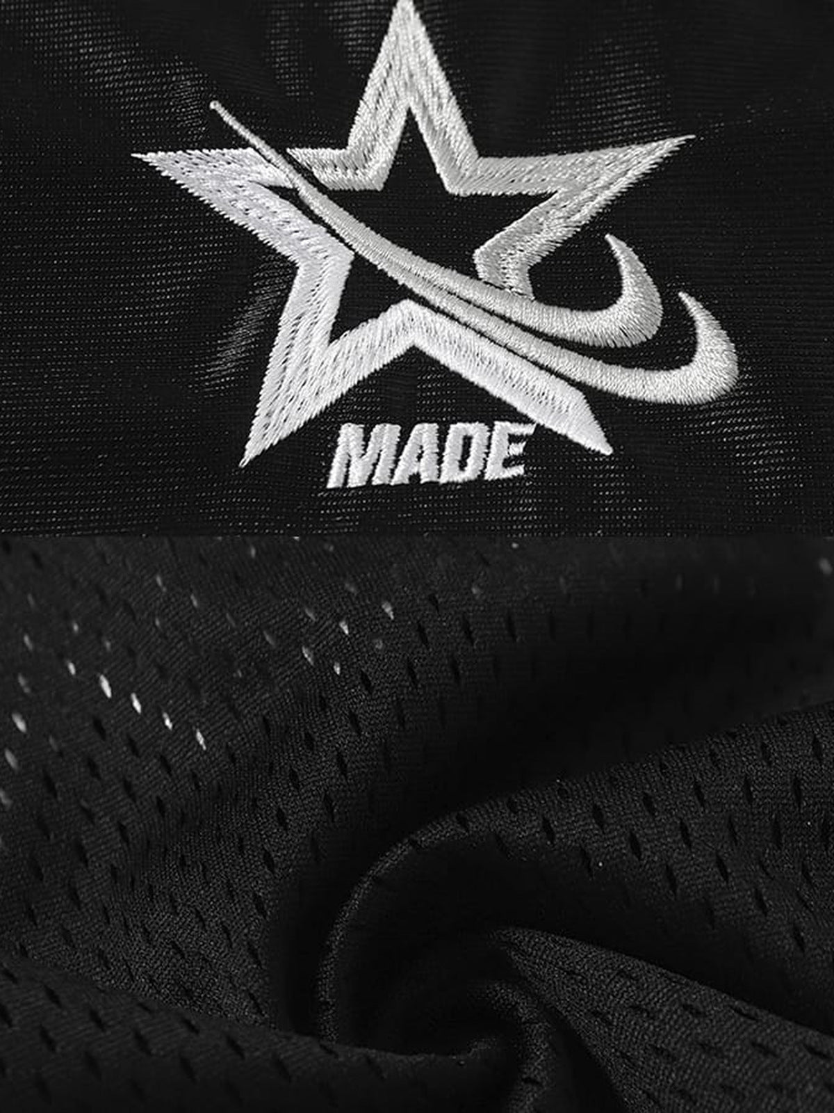 Number 68 jersey – Black, embroidered star close-up | XoKool