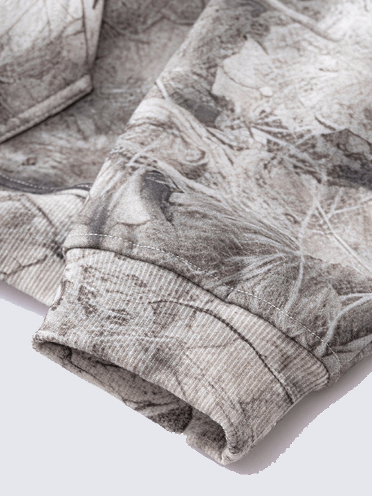 Hoodie de camuflaje – detalle del puño | XoKool