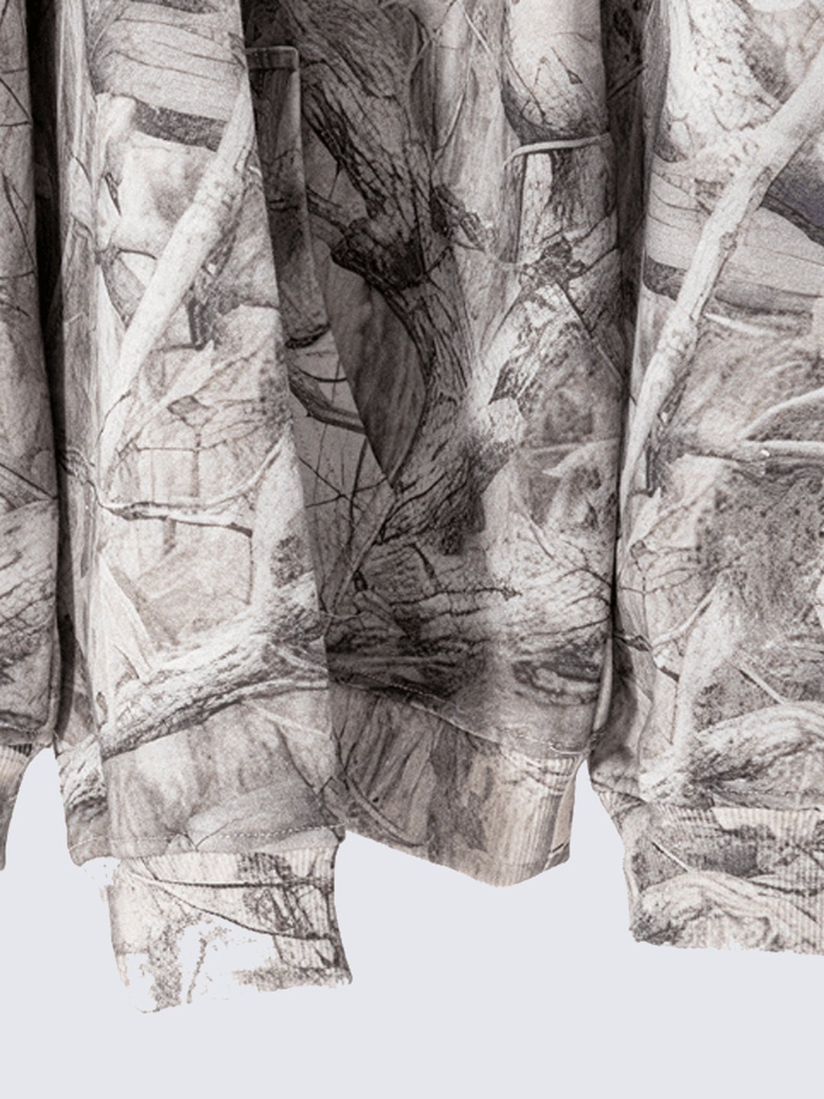 Hoodie de camuflaje – primer plano del dobladillo | XoKool