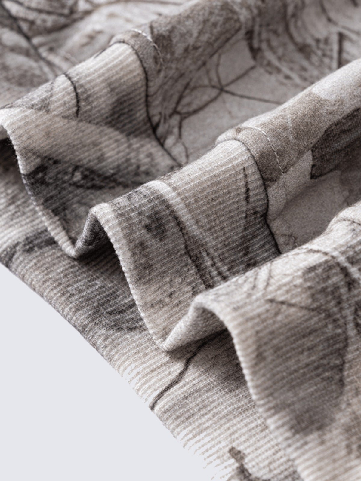 Hoodie de camuflaje – primer plano del dobladillo acanalado | XoKool