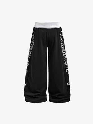Pantalones deportivos oversize – Negro, lateral en plano | XoKool