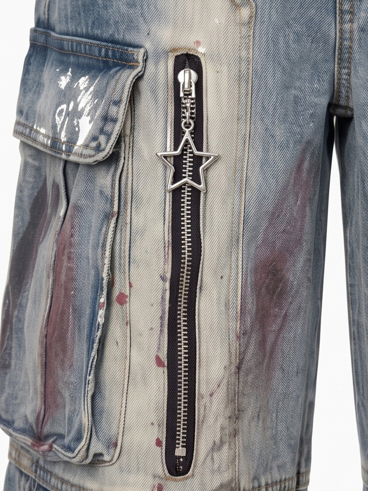 Wide Leg Cargo Jeans mit Farbspritzern und Reißverschlüssen – Nahaufnahme von Reißverschluss mit Stern-Zipper und Cargotasche | XoKool