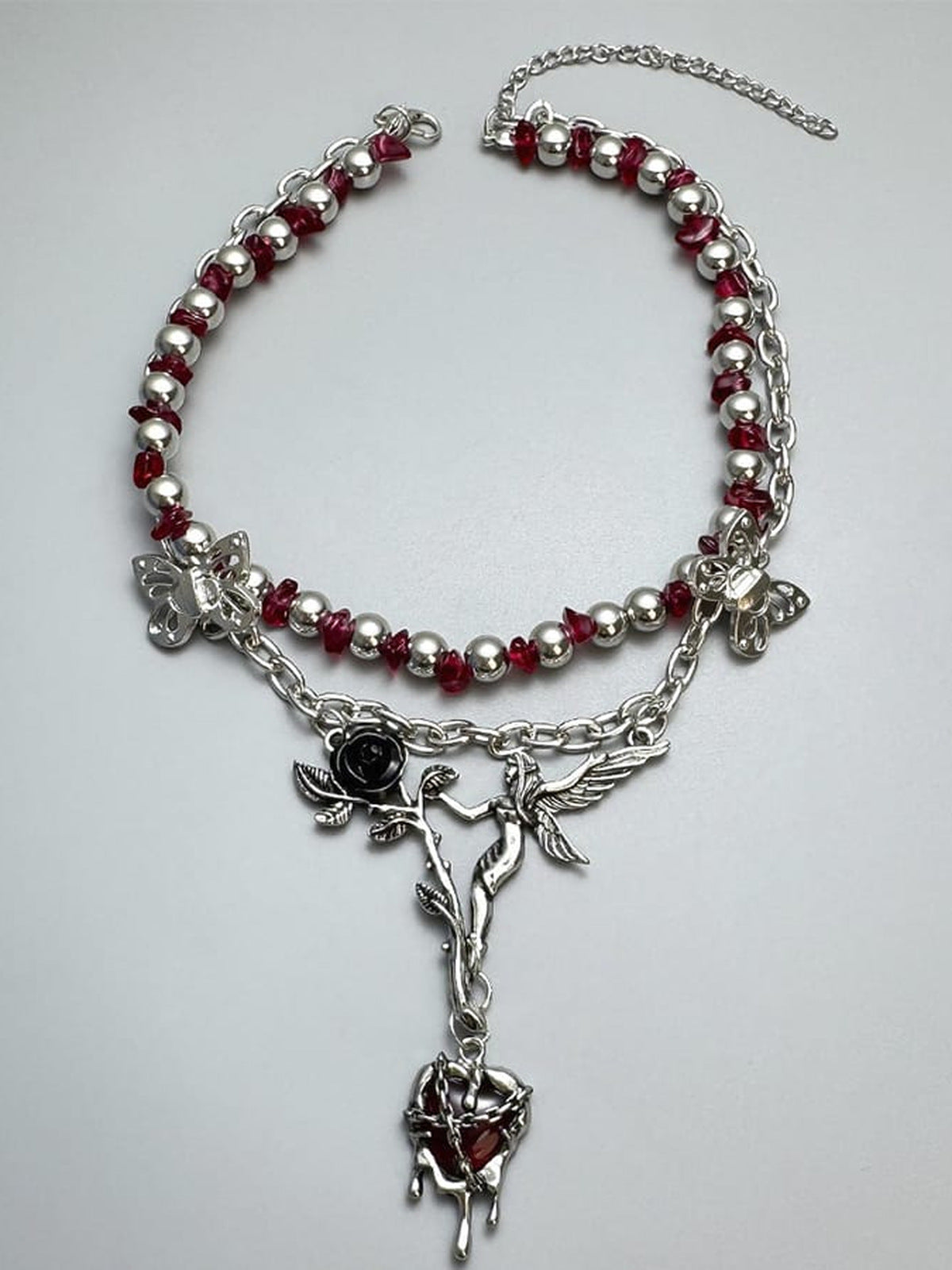 Red Bead Choker with Rose and Butterfly Charms – flat on grey | XoKool