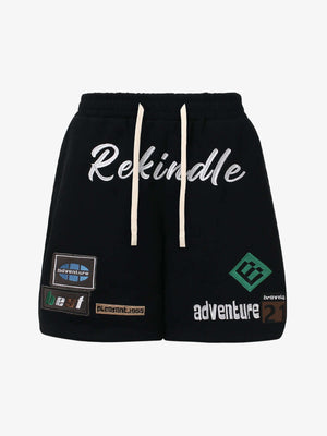 Sweat-Shorts mit gestickten Patches – Schwarz, Vorderseite flach | XoKool