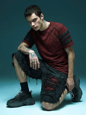 Jorts baggy rotos – En modelo arrodillado, negro | XoKool