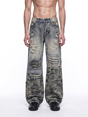 Ripped Camo Patchwork Jeans – on model, front | XoKool