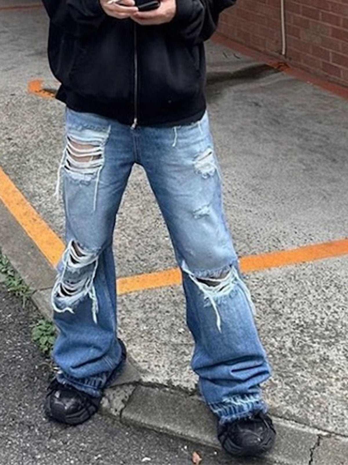 Ripped Light Wash Flare Jeans – street photo, front | XoKool