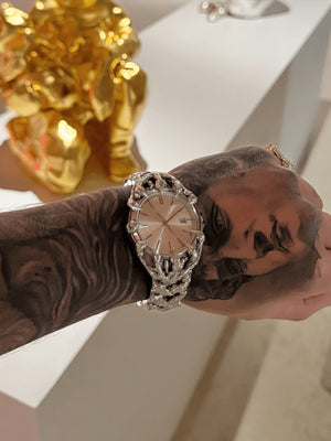 Claw bracelet watch – on tattooed wrist, gold skull decor | XoKool