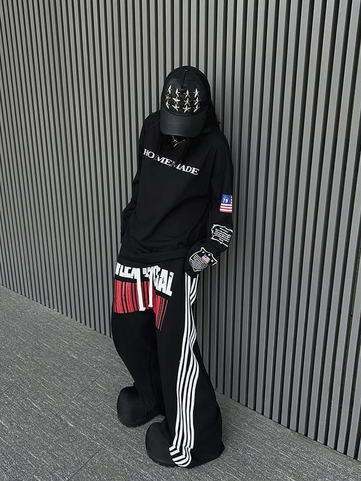Side stripe sweatpants – Black, on model street | XoKool