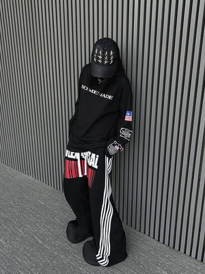 Side stripe sweatpants – Black, on model street | XoKool