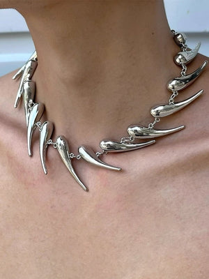Silver-Tone Fang Spike Choker Necklace – on model, neck close-up | XoKool