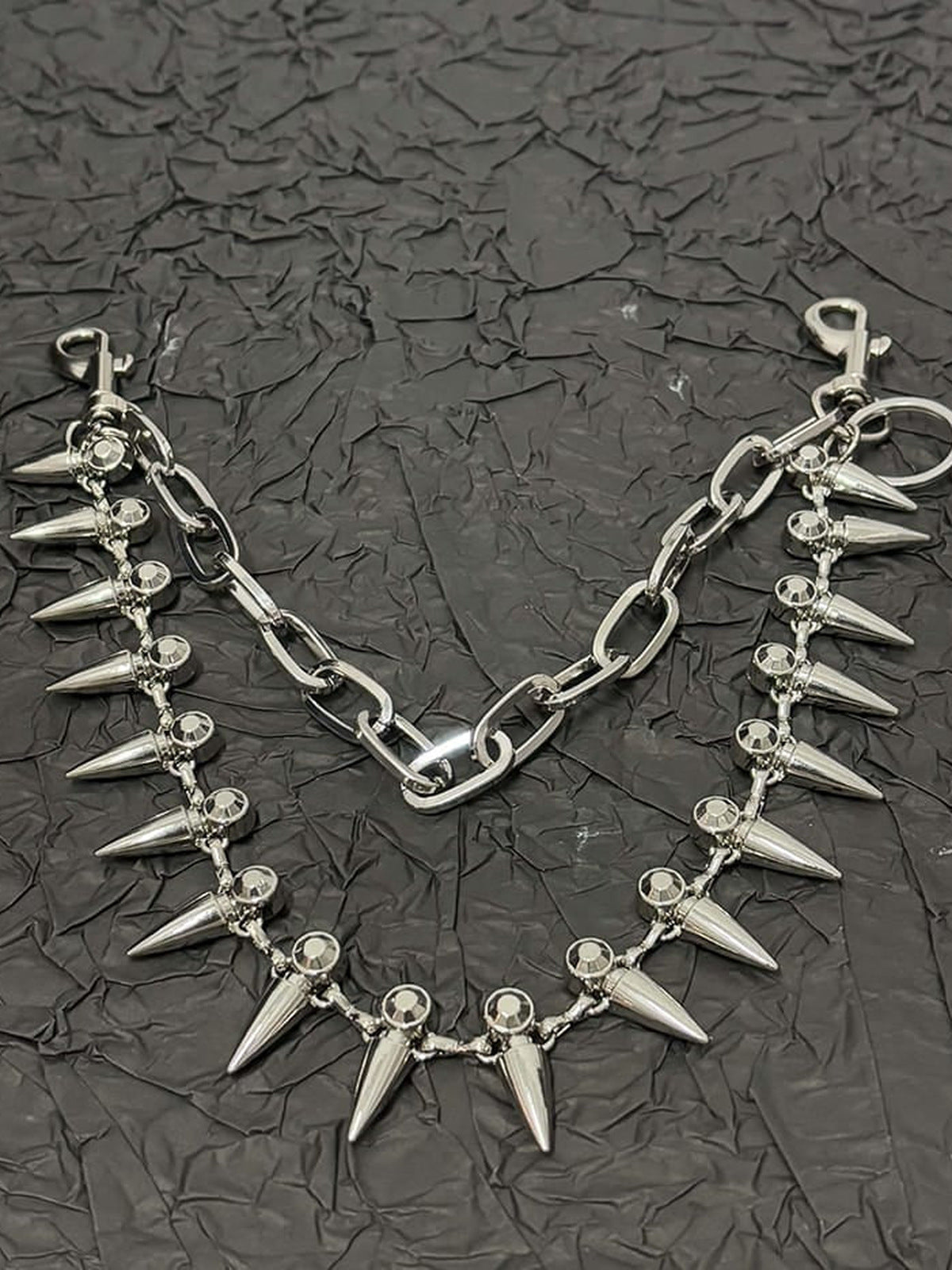 Spiked Double Chain Necklace and Pants Chain – flat lay on dark background | XoKool