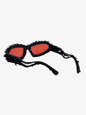 Gafas de sol con pinchos – lente roja, lateral | XoKool