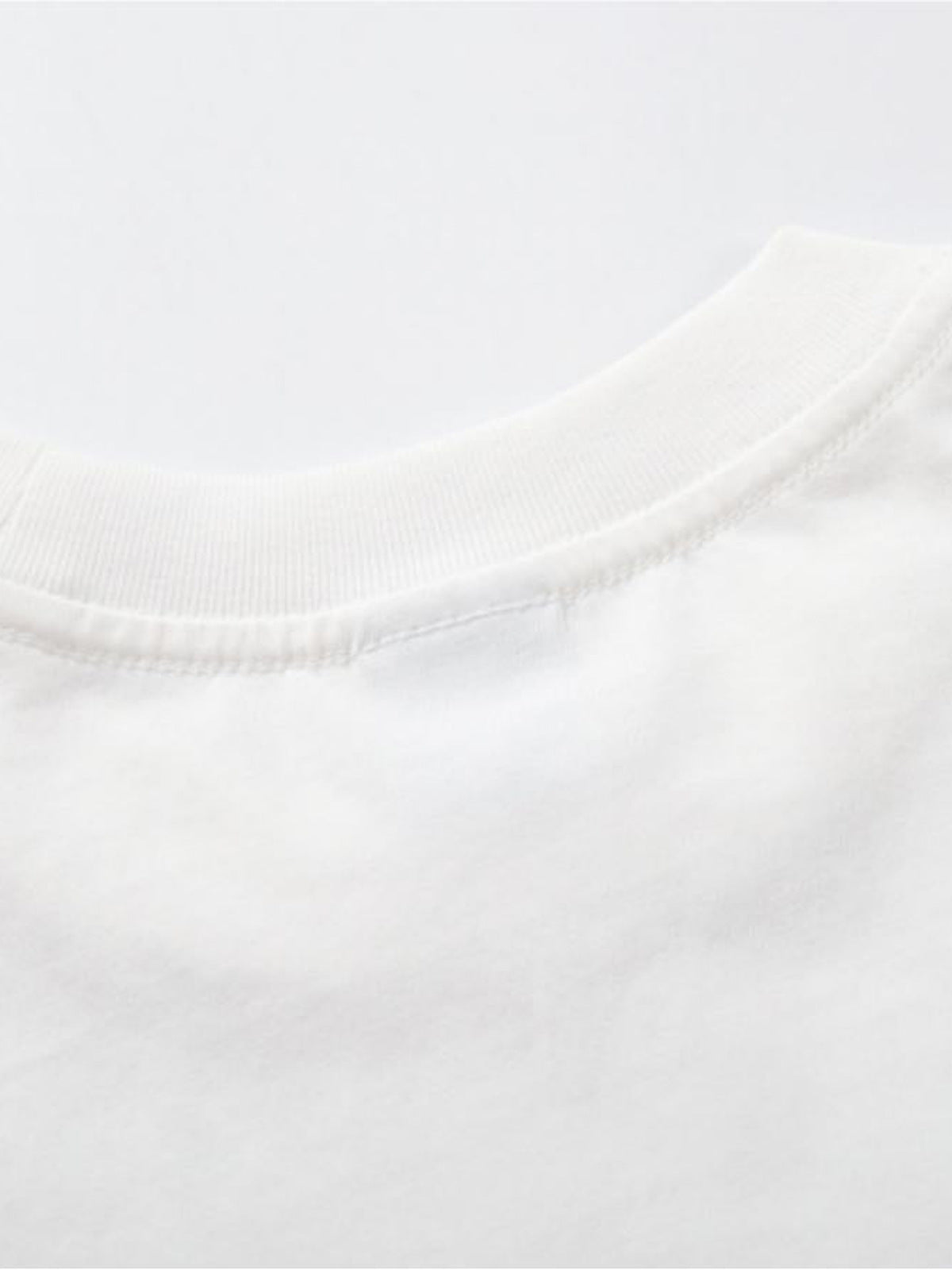 Spiral-Schriftzug Longsleeve – Ausschnitt Nahaufnahme | XoKool