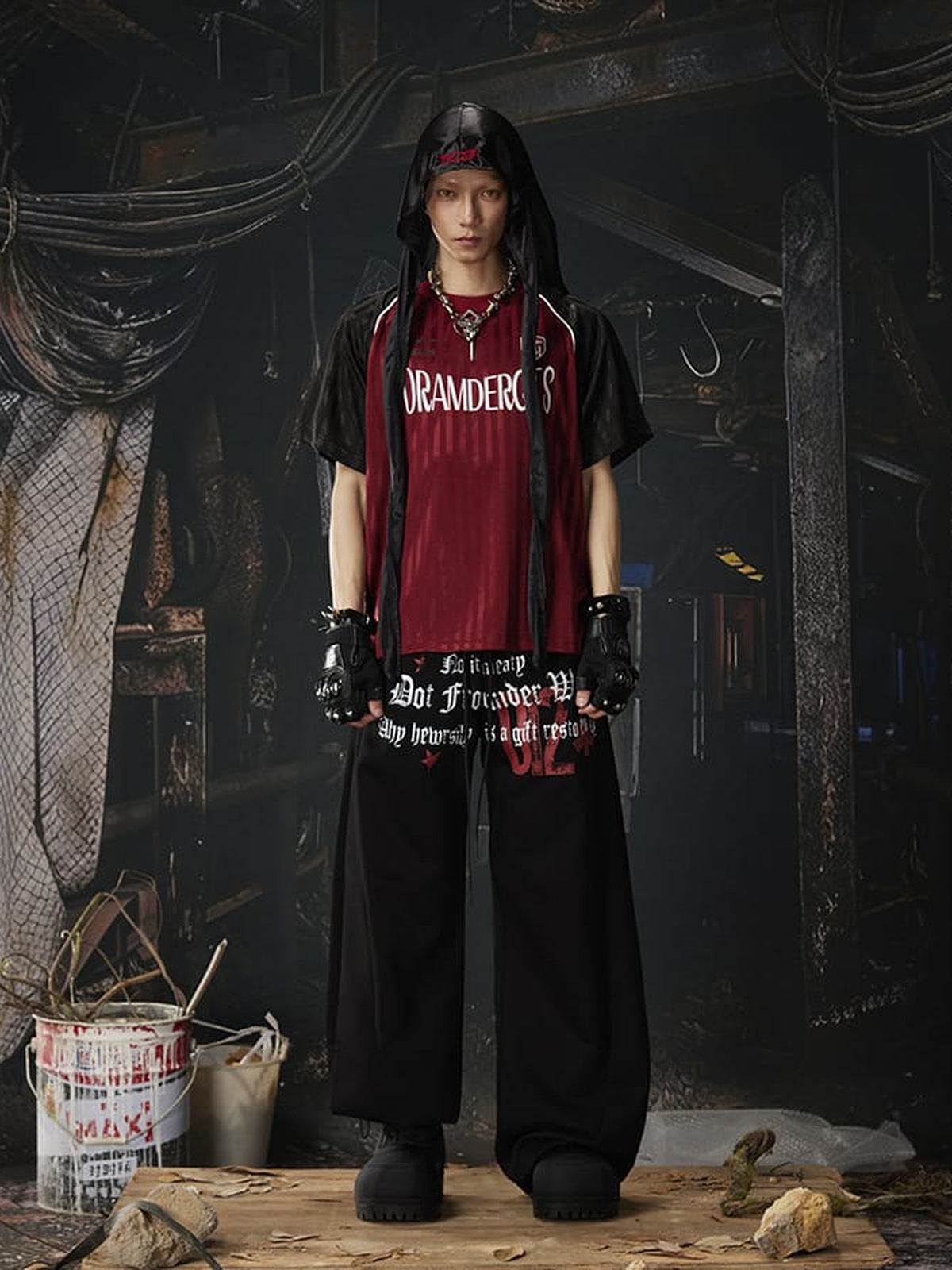 Graphic sweatpants – Black, on model with hood | XoKool