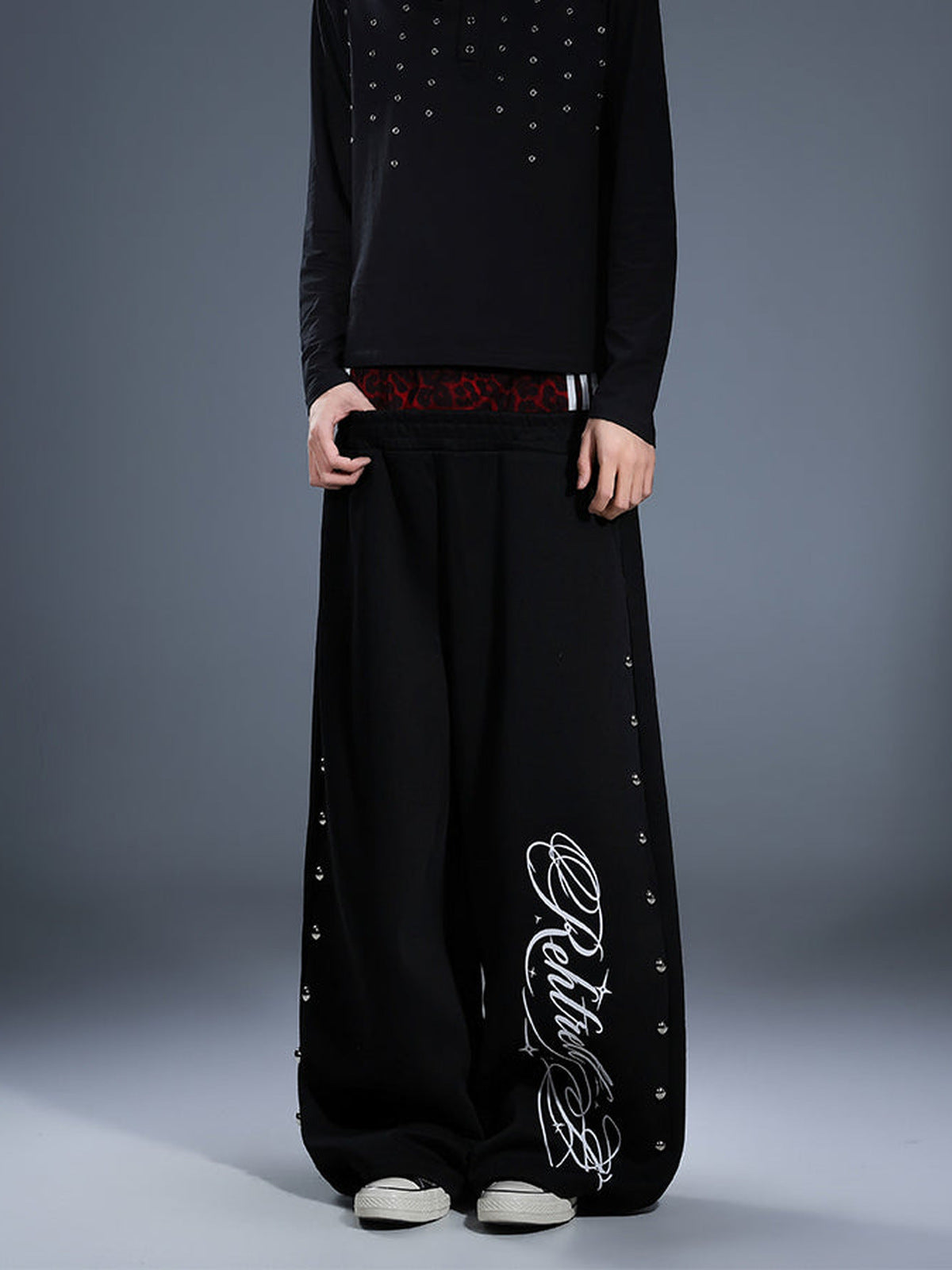 Studded Wide Leg Sweatpants with Leopard Waistband – Black, on model front | XoKool