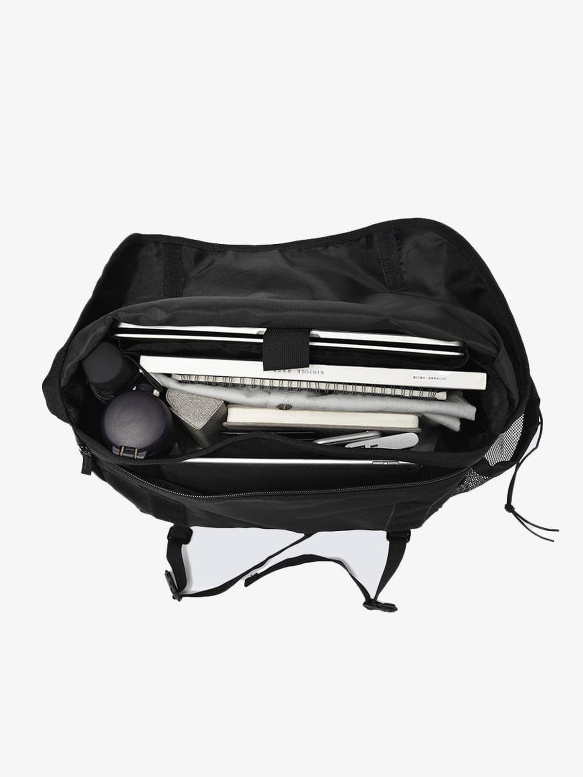 Techwear messenger bag – open top, inside with laptop and books | XoKool