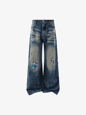 Vintage Flare Jeans with Patch Repairs – front flat | XoKool