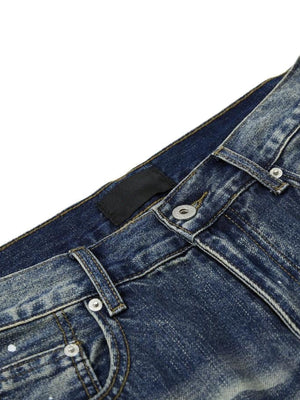Vintage Wash Wide Leg Jeans with Paint Splatter – waistband and button fly close-up | XoKool