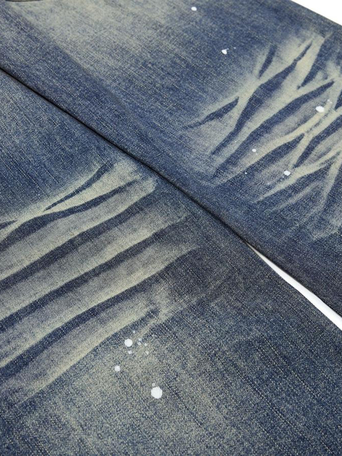 Vintage Wash Wide Leg Jeans with Paint Splatter – whiskers and paint flecks close-up | XoKool