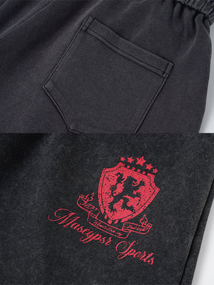 Number print sweatpants – Back pocket and crest print close-up | XoKool