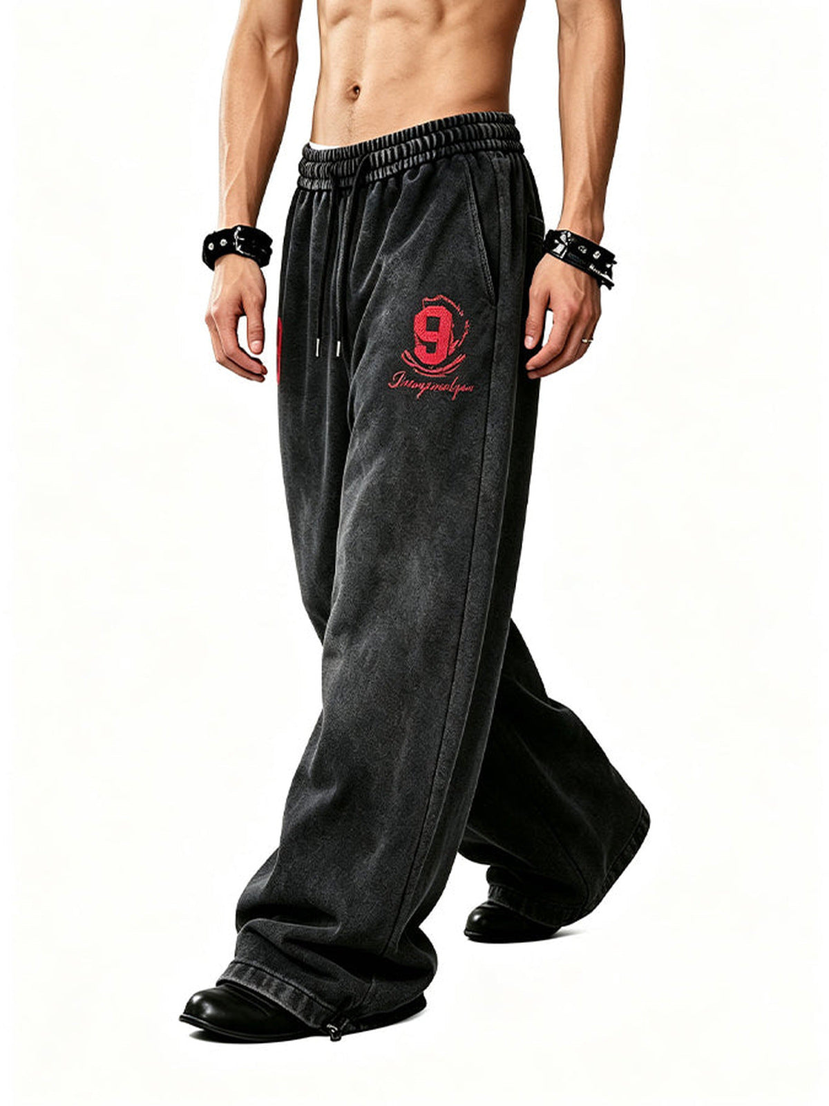 Number print sweatpants – Black, on model side | XoKool