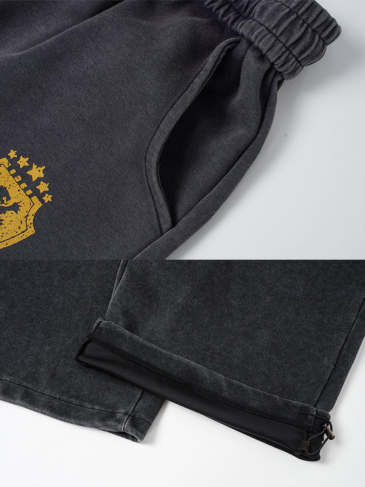Number print sweatpants – Gold crest and hem close-up | XoKool