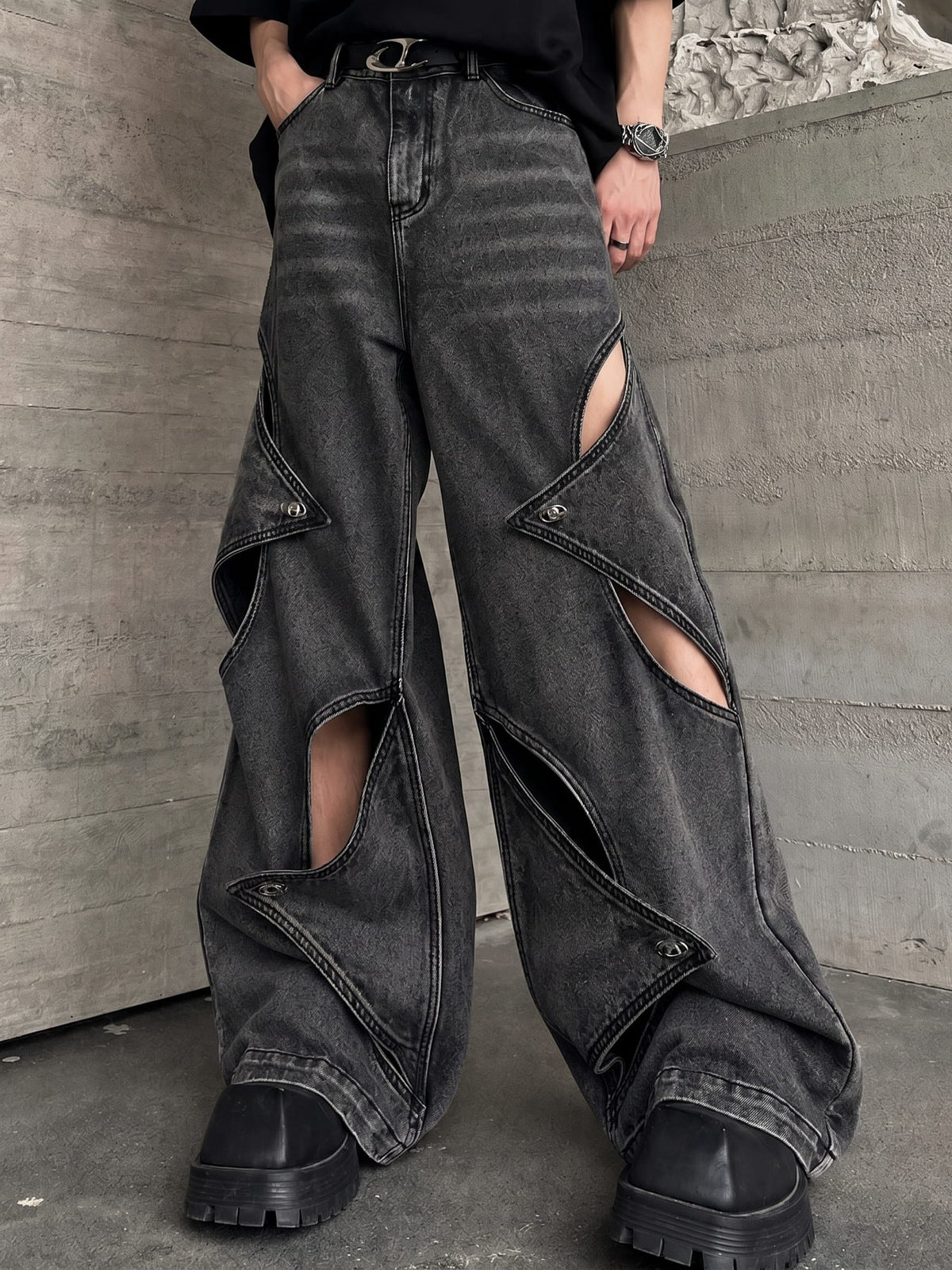 Washed Black Baggy Jeans with Star Cut-Outs – on model, front (street photo) | XoKool